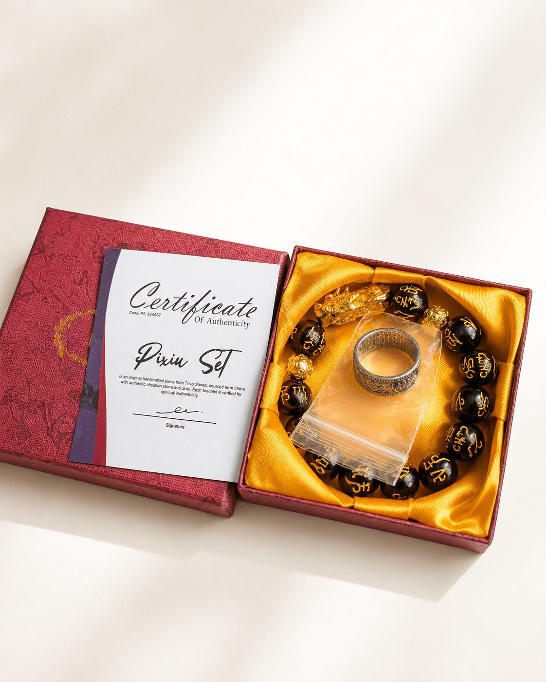 The complete Pixiu set in the branded box with certificate